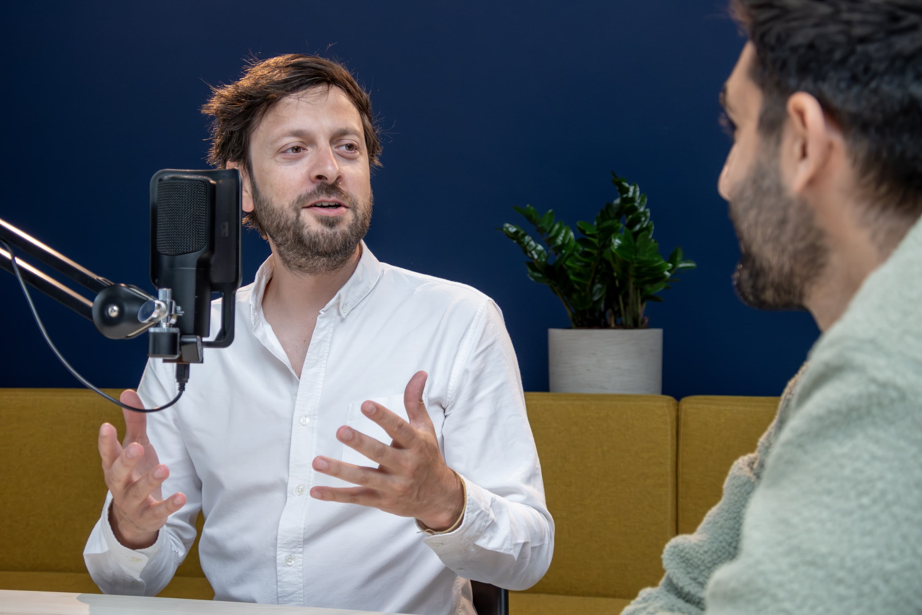 Phil speaking to his podcast host